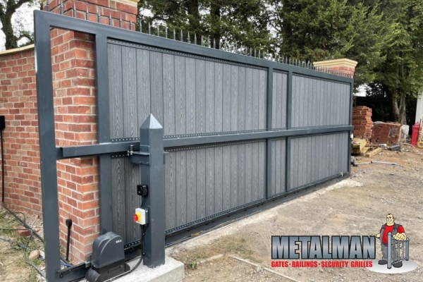 Sliding automated gate composite and steel